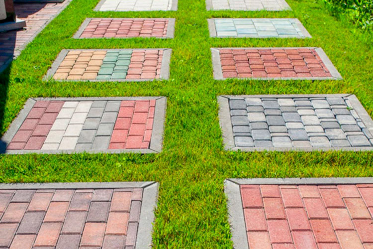 Outdoor display of paving samples in several colours and laying patterns